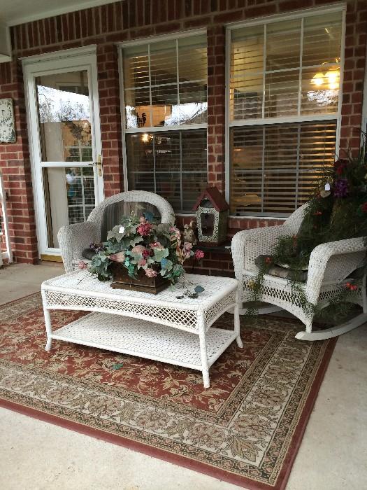      White wicker rockers & matching coffee table