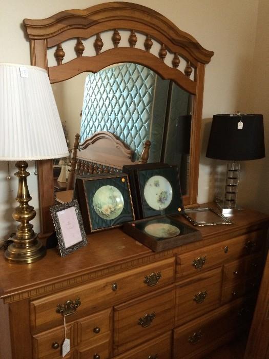      Dresser, lamps, and hand-painted framed plates