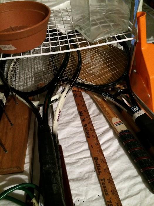                     Several tennis racquets
