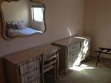 More of the bedroom set - a dresser, chair, desk and large mirror
