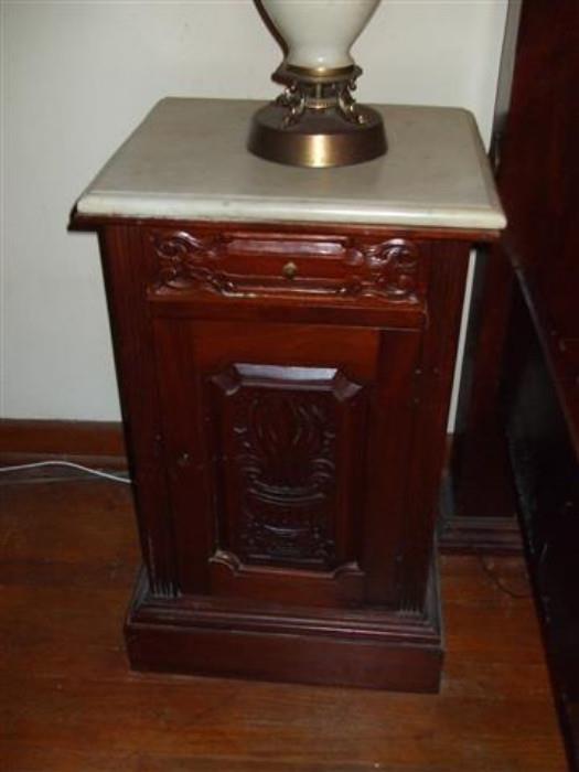 pair of marble top night stands