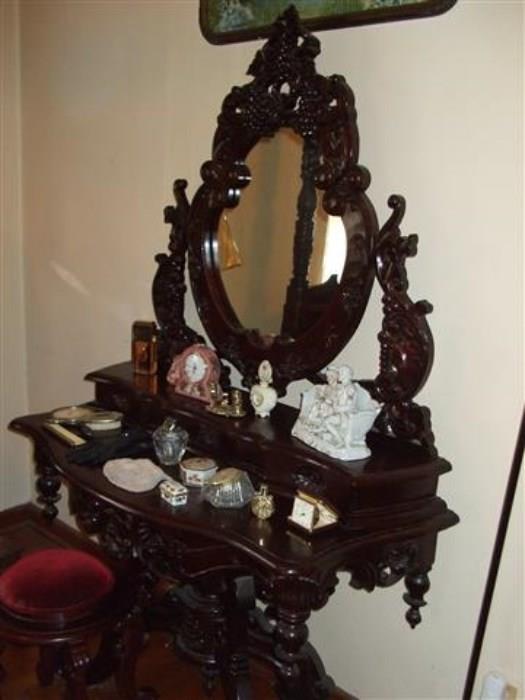 ornate carved wood vanity