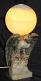 Early 20th Century Unsigned Carved Marble Eagle Lamp with Alabaster Globe. One of a pair, shown Lighted