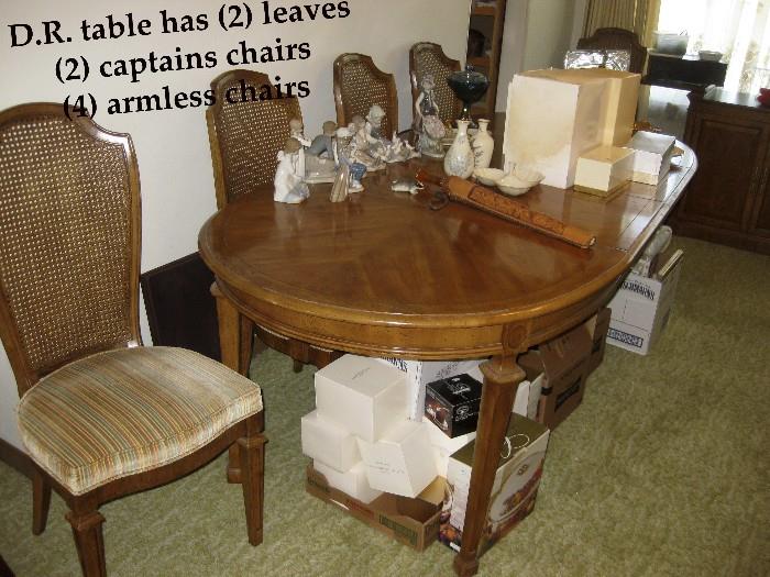 Extremely nice 70's Table with (2) leaves (4) chairs and (2) captains chairs