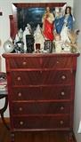 Highboy dresser w/ mirror, old cameras, religious statues