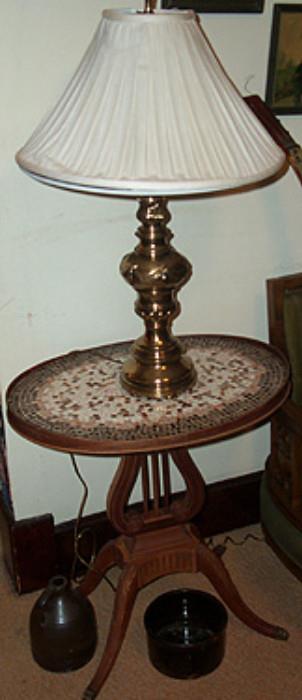 Lyre table with tile inlay, brass lamp