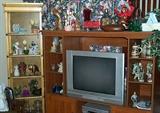 Entertainment center w/ 32" wide TV opening, gold shelf, old steins, etc...