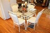 Glass-top table with 4 chairs