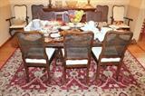 Nice area rug and Ethan Allen dining table with 2 leaves and 10 chairs