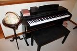 Suzuki digital piano with bench and globe