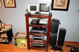 Various electronics including Aiwa stereo system, entertainment center, records, and more!