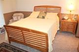 Nice queen bed and matching nightstand