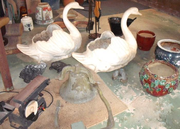 Large heavy cast iron swans,  Old School Bell,  Interesting pottery,  Belt sander,  
