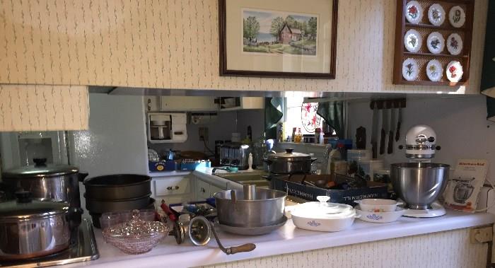 Kitchen Aid Mixer, Pots and Pans, Hamilton Beach Toaster, Cake Pans, Knives, etc. 