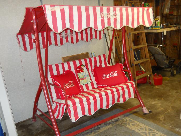 never seen one before, a vintage Coca Cola swing.