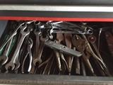 Hundreds of tools!  Wrenches, saws, screwdrivers, hammers, socket sets, pliers, etc.