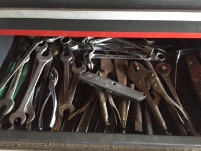 Hundreds of tools!  Wrenches, saws, screwdrivers, hammers, socket sets, pliers, etc.