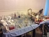 Milk glass, cut glass and fine crystal pieces, silver plated pieces and ceramic tea sets.