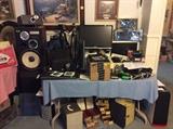 Bose speakers, cameras, binoculars, computers, monitors, clocks, slide projector and vintage storage cases
