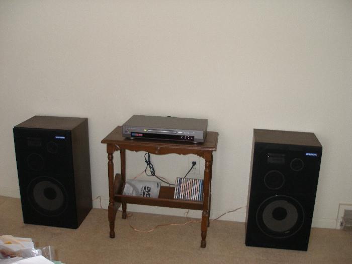 speakers, end table, CD's