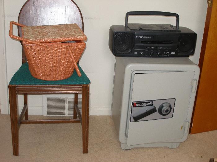sewing basket, vanity chair, safe, CD, radio, cassette player
