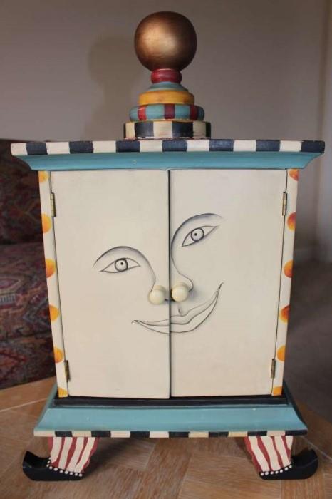 One of the many whimsical pieces in this sale: these two doors hide 4 square cubby holes