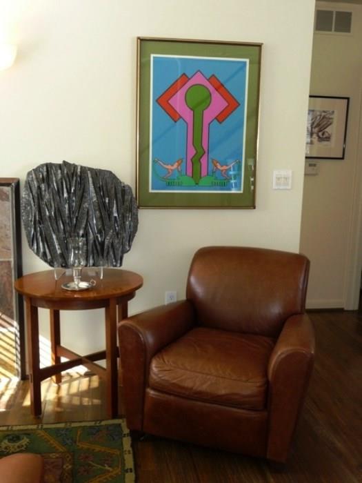 Pottery Barn Leather Club Chair, Stickley Mission-style Side Table, Orthoceras Cephalopod Fossil Plaque, and Peter Max Screenprint, C. 1971