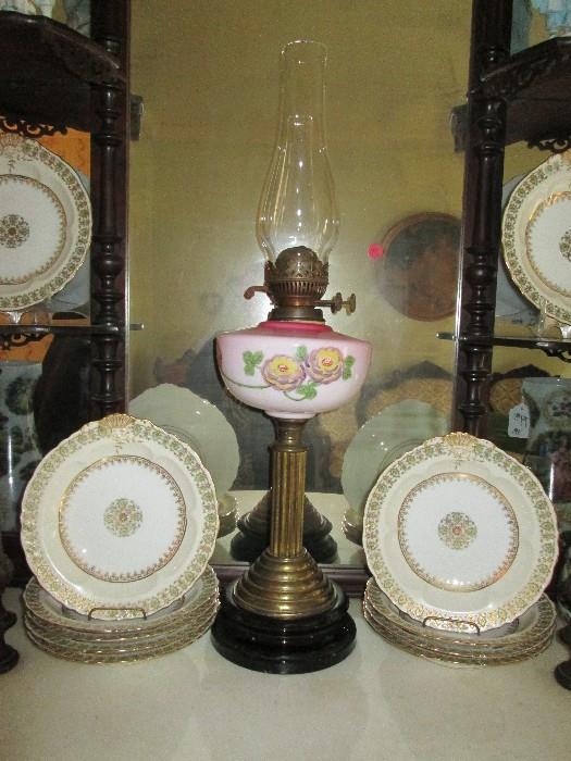 Antique oil lamp & Limoges shell crested soup bowls