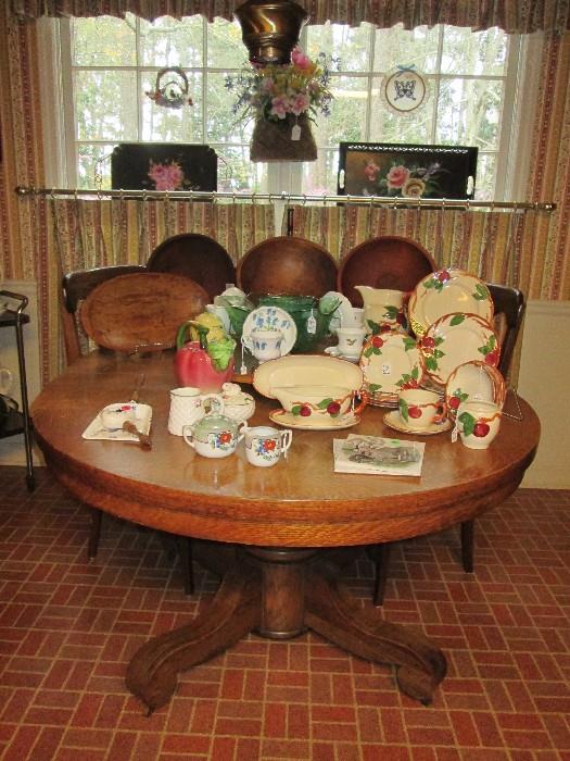 Franciscan "Apple" dishes, old wooden dough bowls, antique oak pedestal table, etc
