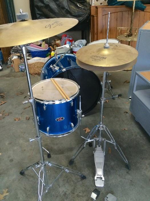 Like-new PDP drum set with five drums, three cymbals, pedals, etc.