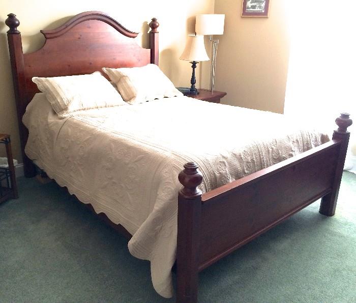 Queen bed with matching end tables, bureau with mirror, armoire and, also shown, ivory quilt and shams