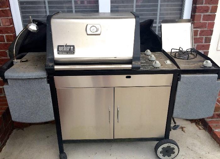 Weber Genesis Gold grill with cabinet and burner