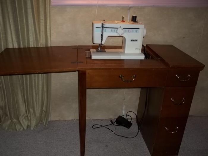 sewing machine in cabinet $50