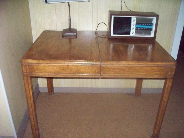 wooden dining table, radio, desk lamp