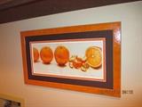 This cute little orange picture brightens any way it hangs on.