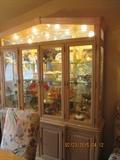 This fabulous china cabinet is being offered for sale, but not the contents.