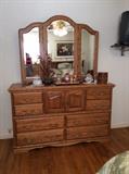 American Heirloom Furniture Dresser with Mirror that has a hidden area for Jewelry.