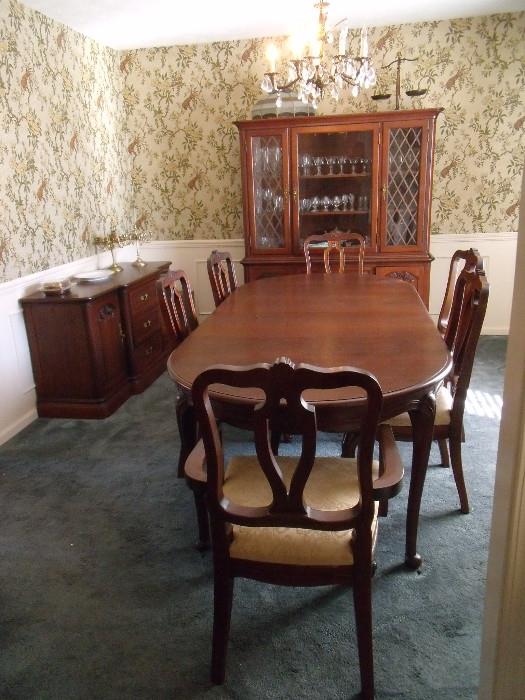 #210 Dinning Table  with 4 chairs and 2 King chairs Leafs 18" ea ( Shown with Leafs In) Ricardo Lyne & co W42D91.5H29  $250 table $650 whole dining set