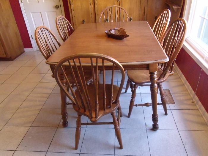 #214 Dinning Table with 6 Chairs D58" without leafs Approx 82" with leafs. W39D58H30.25  $110