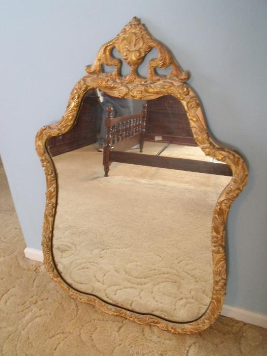 #242 Guilded Wood Framed Wall Mirror W2D29.5H41.75 $50