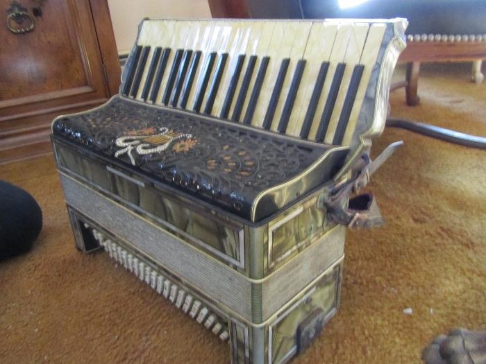 Accordion from the 1930's Purchased New in this family in the 1930's. On hand at this estate are original photos from this time period showing this same accordion.