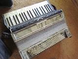 Accordion from the 1930's Purchased New in this family in the 1930's. On hand at this estate are original photos from this time period showing this same accordion.