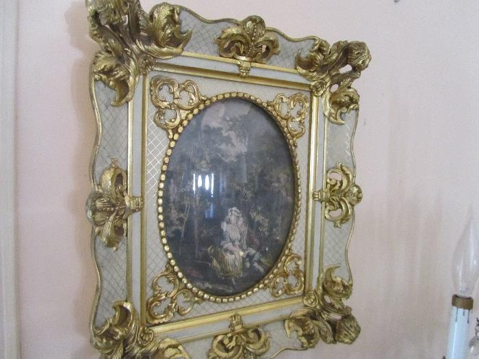 Amazing gold gilt scroll ormolu frame with checkered pattern with curved glass framing a partially colored antique lithograph