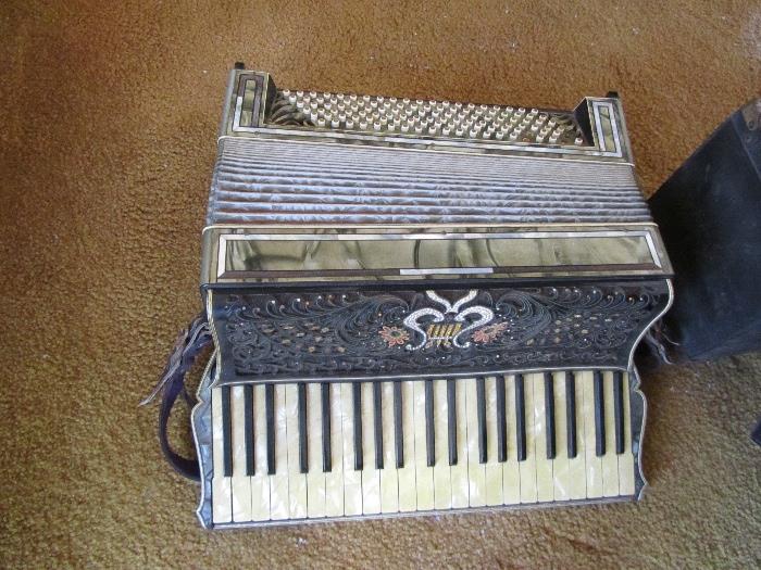 Accordion from the 1930's Purchased New in this family in the 1930's. On hand at this estate are original photos from this time period showing this same accordion.