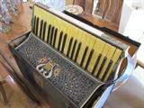 Accordion from the 1930's Purchased New in this family in the 1930's. On hand at this estate are original photos from this time period showing this same accordion.