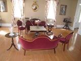 Furniture in photo is from a prominent estate and will be sold at this auction!