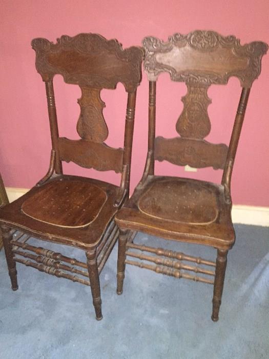 Several Oak Pressed Back Chairs
