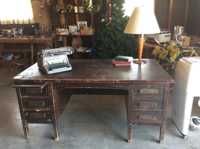 I am obsessed with the vintage industrial desk!  Yes, it's a great desk. But, add some casters and you have an amazing kitchen island! 
