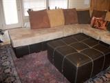 Hugh sectional with ottoman and large chair, priced today all for $ 500.00, cost over $2000.00 new