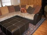 Hugh sectional with ottoman and large chair, priced today all for $ 500.00, cost over $2000.00 new